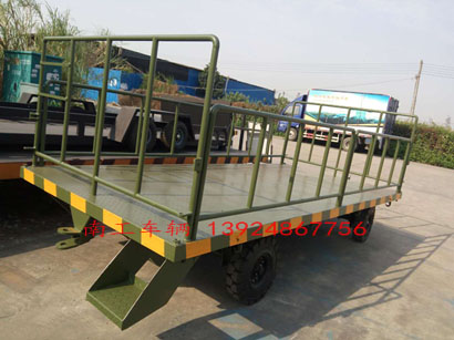1677045795675110.jpg 军绿色5吨护栏式平板拖车2I.jpg