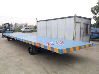 1676511937141453.jpg 30吨10米重型平板拖车3I.jpg