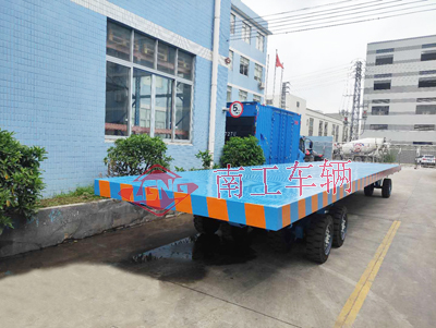 1686812638897398.jpg 30吨12米长重型全挂平板拖车3I.jpg